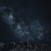 Star-filled night sky over mountains Starry sky with Milky Way over mountains